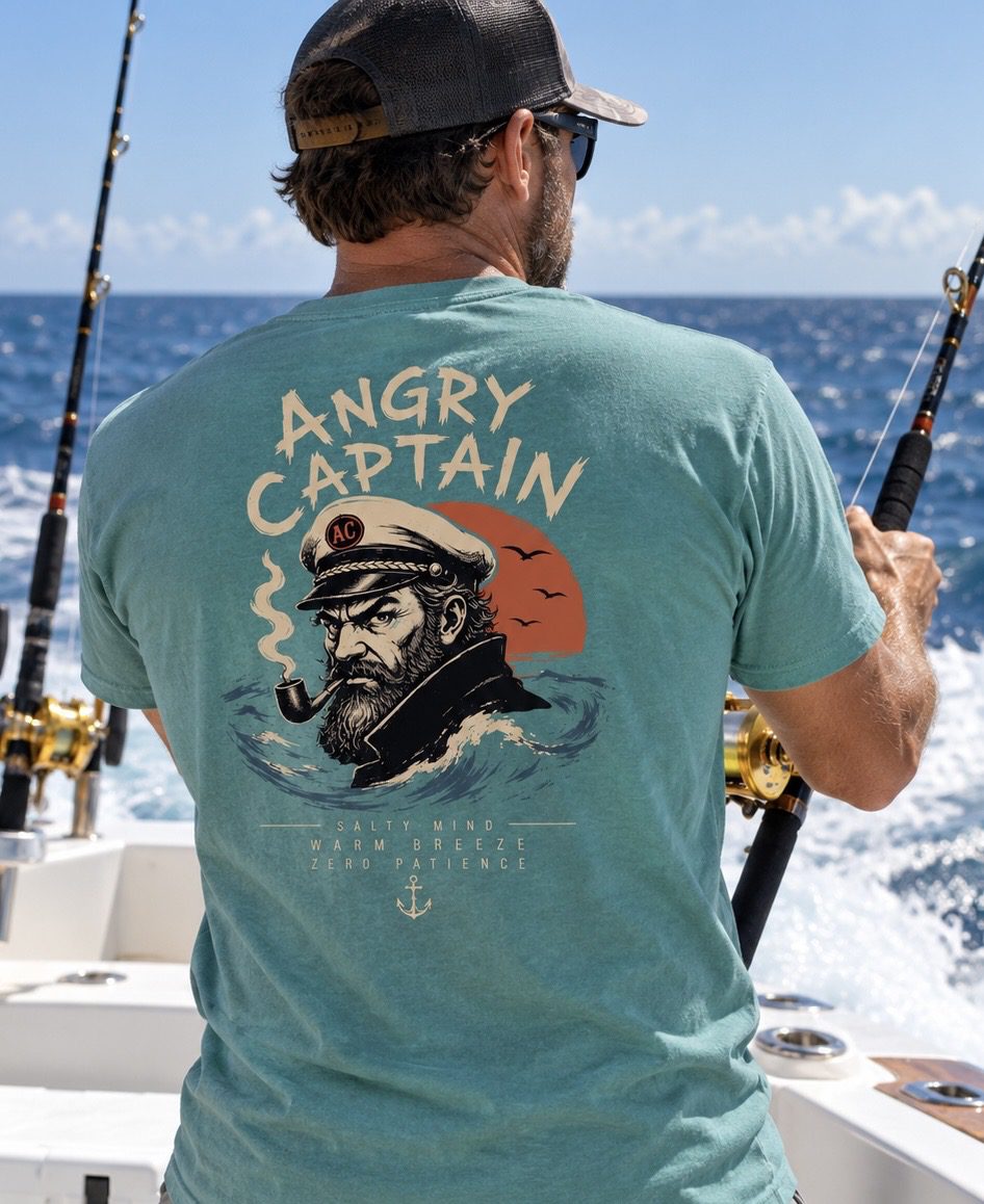 Man fishing on boat wearing Angry Captain shirt