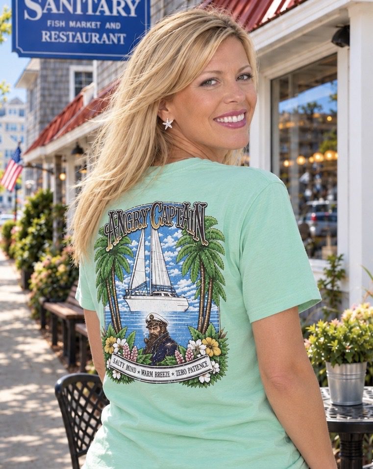Blonde woman showing sailboat graphic t-shirt