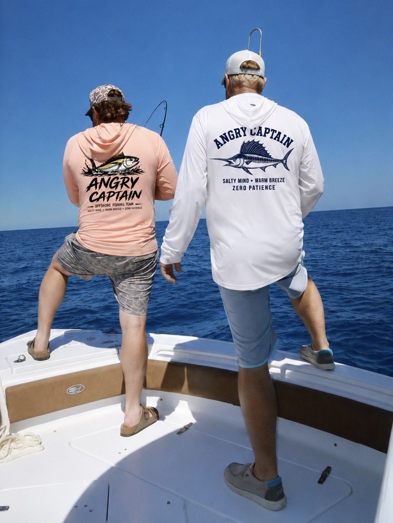 Two anglers on boat wearing "Angry Captain" shirts